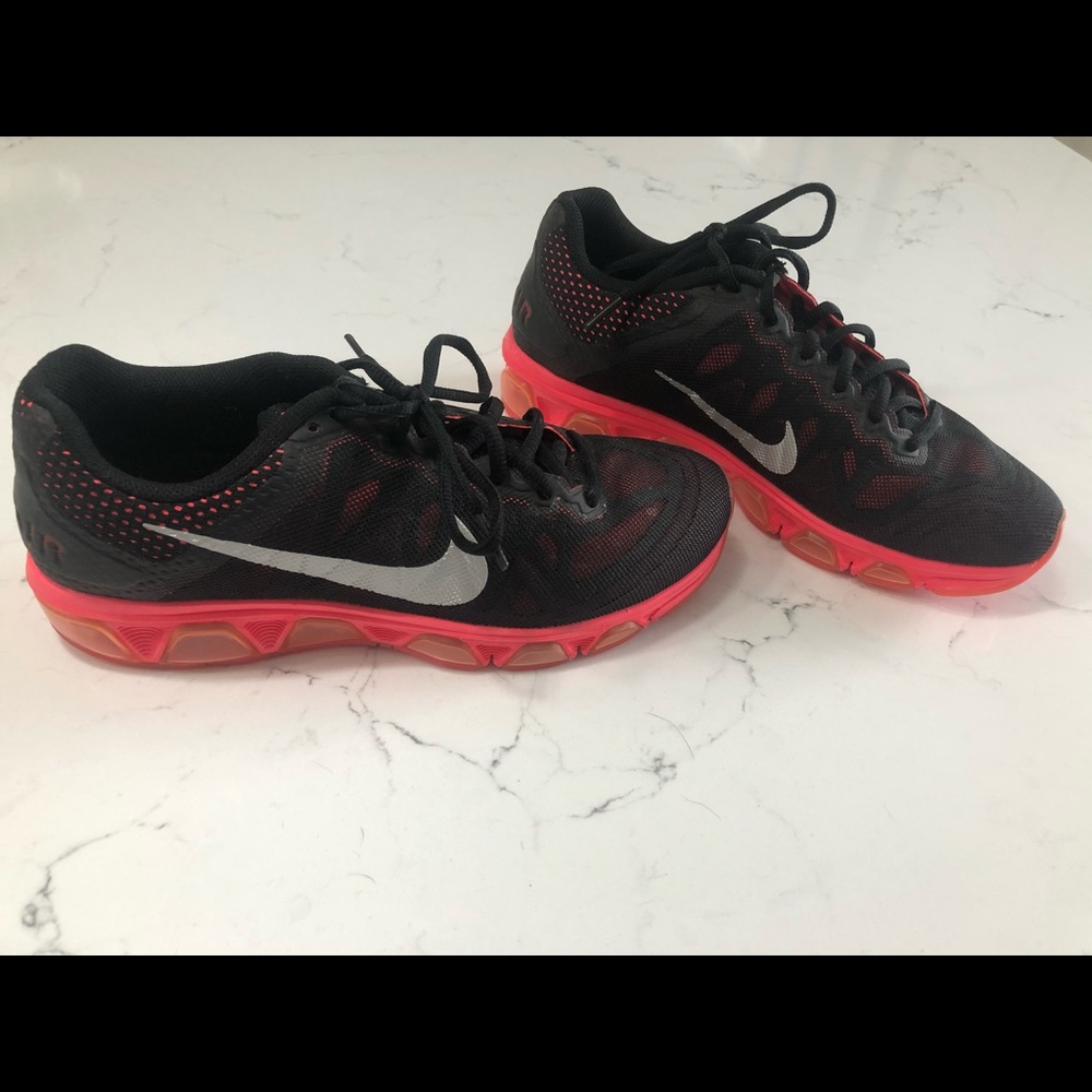 Nike sneakers with hot pink soles